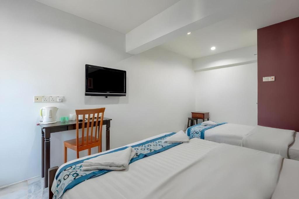 Oyo 89874 Gs Golden Star Hotel سيري كيمبانغان المظهر الخارجي الصورة