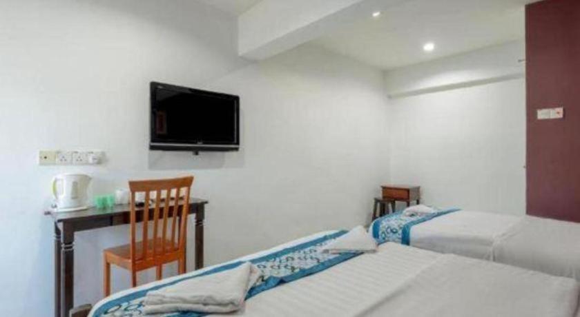 Oyo 89874 Gs Golden Star Hotel سيري كيمبانغان المظهر الخارجي الصورة